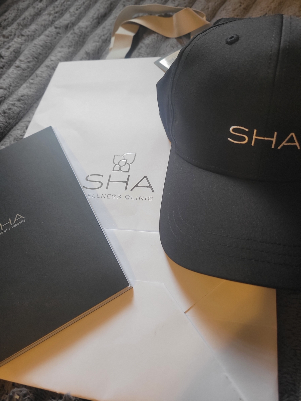 SHA Wellness Clinic Black Baseball Cap with Embroidered Logo